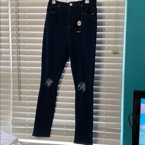 High waisted distressed skinny jeans